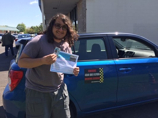 Joe is delighted at getting his licence. No more walking for him to get to work