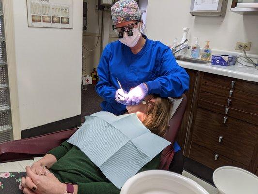 Dental assistant with patient at Harrison Family Dentists