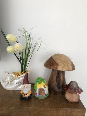 The only Dollar Tree items are: smaller ceramic mushroom, gnome, yellow ceramic house & faux flower