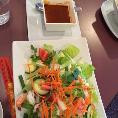 Seafood salad with mildly spiced dressing - shrimps, scallop (cerviched), imitation crab