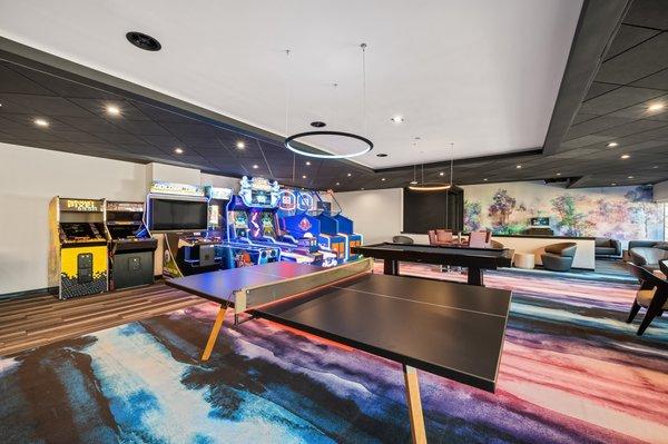 Our gaming lounge features a state of the art Golf simulator, an arcade, ping pong, billiard tables and more.