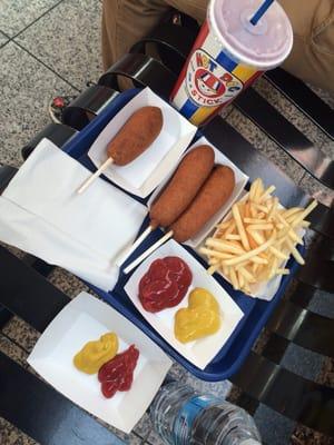 2 turkey hot dogs on a stick. 1 american cheese on a stick. Fries on the side. And a large cherry lemonade.