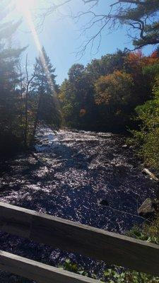 A downstream view of the Peshtigo from the large footbridge at McClintock Park