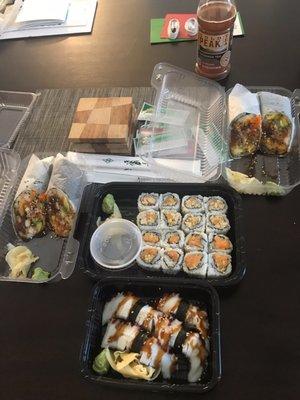 4 pieces of Tako (octopus) sushi, sushi combo #4 (crunchy chicken and crunchy salmon), and two orders of the regular sushi burritos.