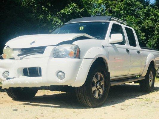 We bought this 2003 Nissan Frontier for cash.