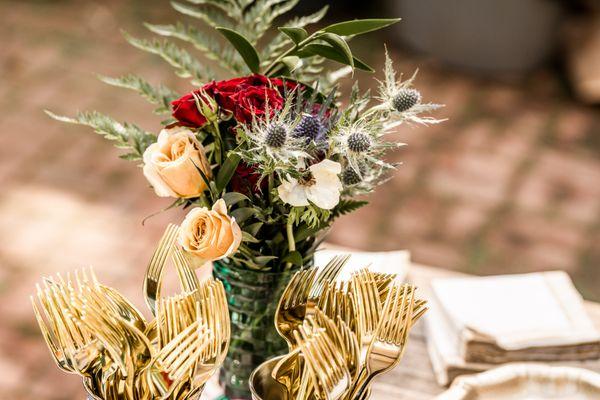 Florals on cake table, party supplies by EnFete.