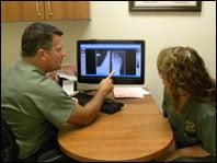 Dr. Burke reviewing digital X-rays