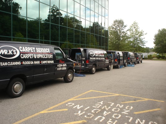 Five carpet cleaning units running at a large commercial job site.