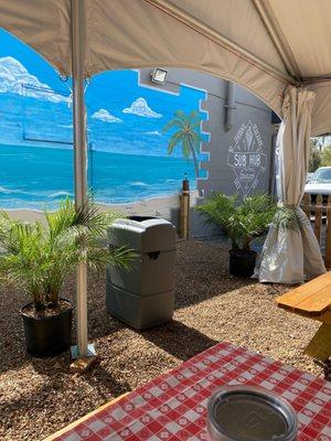 Outdoor seating cute beach mural