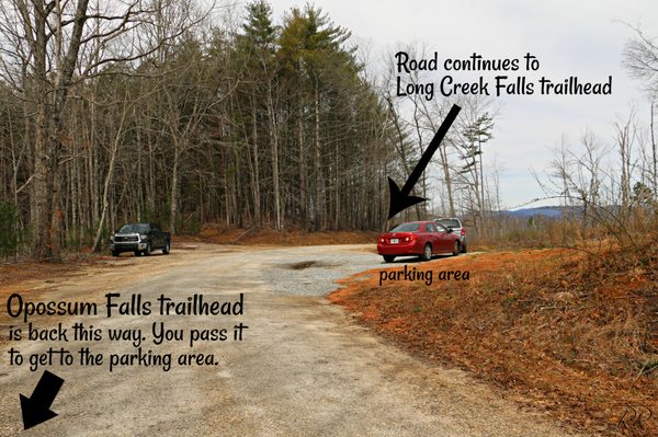 You will pass the trailhead (marked with boulders) on your left just BEFORE the parking area