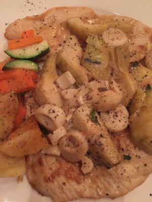 Capri with artichokes, hearts of palm served a top chicken breast.