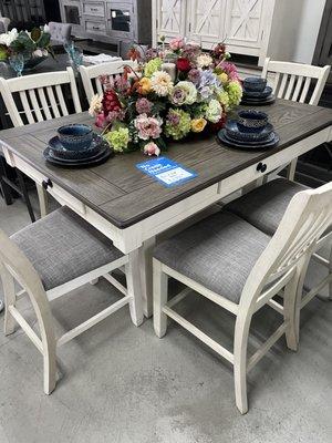 Dining Table includes 1 table and 6 chairs, $1,395