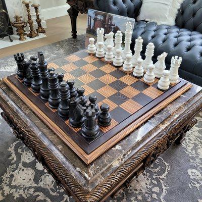 A chessboard, recently finished for a customer.  It's made of Wenge and Zebrawood.