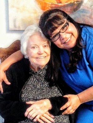 Miss Maxine lived over six years in the Lake Arlington area personal carr homes. Here being hugged by one of her
dear caregivers.