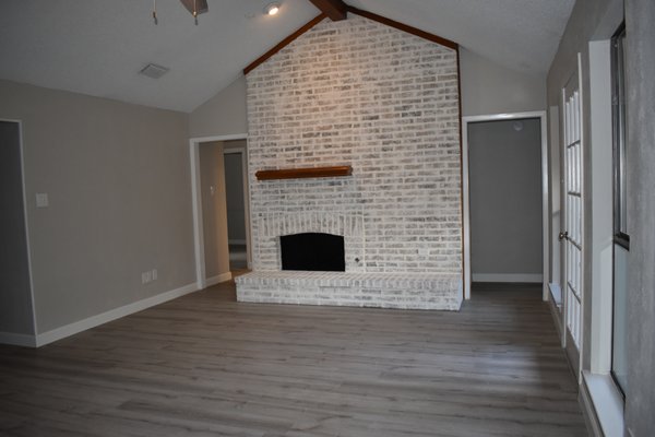 Lime washed fireplace and new flooring