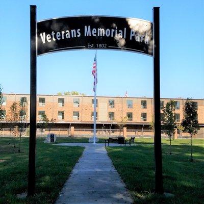 New signage and a memorial flag