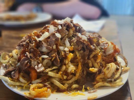 Huge plate of Brisket Fries! Had leftovers for dinner! It might be my new favorite!