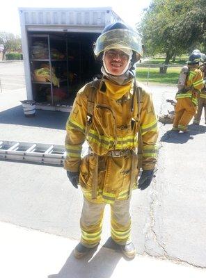 Emergency Medical Responder students suits up for skills testing.