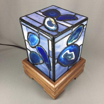 We have an exclusive line of stained glass and agate lamps made here in the studio. The perfect gift for that someone who has everything.