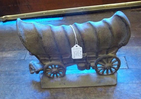 Cast iron covered wagon door stop