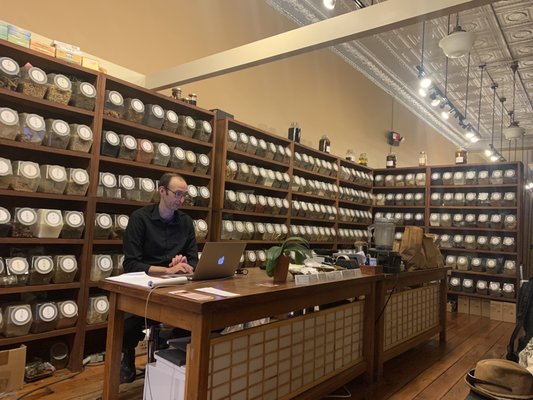 Front desk/reception - most well organized herb library I've ever seen