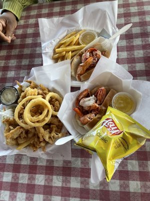 Clam strip dinner, 2 hot lobster rolls - one with chips, one with fries. Delicious.