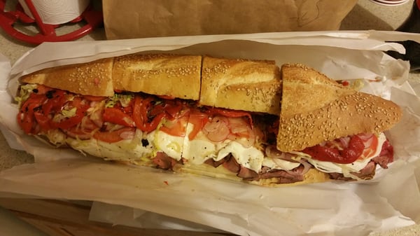 The best sandwich in Orange County! 
 Homemade Roast Beef, Fresh Mozzarella,  Lettuce,  Tomato,  Onion, Sweet & Hot Peppers, Oil & Vinegar.