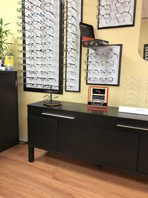 Eyeglasses all over the walls to try on! Love this!