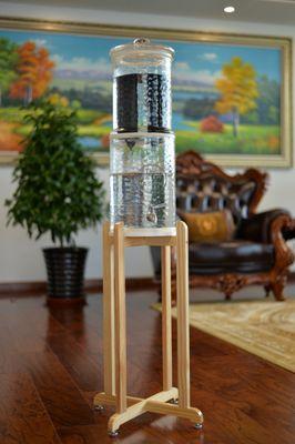 The Water Machine natural wood floor stand