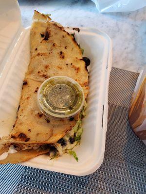 Quesadilla de huitlacoche Quesadilla stuffed with Huitlacoche, pronounced weet-la-COH-cheh, is a fungus that grows on ears of corn