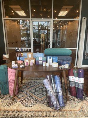 We carry mats, bolsters, toe socks, candles, oils, scrubs, smudge sticks and more.