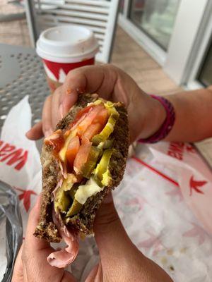 My wife's breakfast sandwich on marble bread, and fresh tomato slices and jalapeños, delicious.