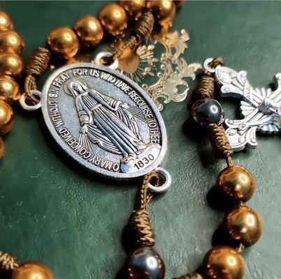 The miraculous metal and a Rosary's