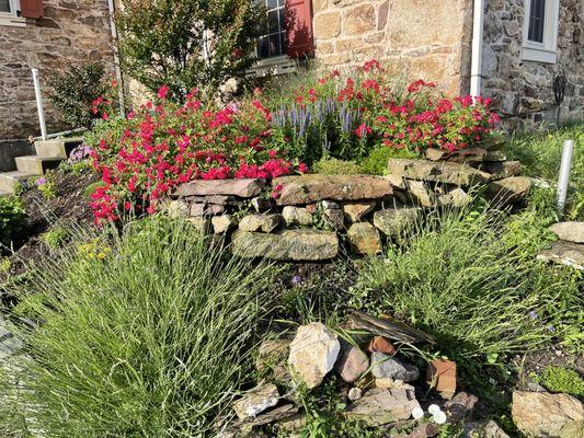 Porch and gardens offer some outdoor special spaces.