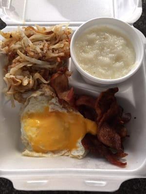 Breakfast $4.99 with a side of Grits $1.50