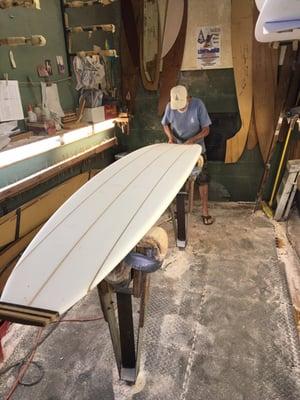 Ole shaping a classic longboard.