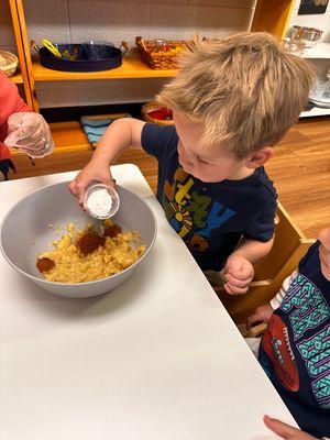 Cooking brings science, math, and practical life skills into our school experience.

Our home like experience makes for a happy childhood.