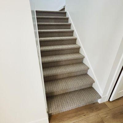 Stairs In Durable Herringbone Carpet.