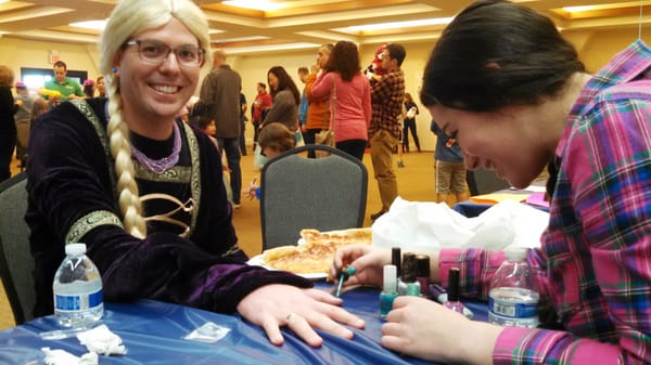 Rabbi Brown having fun at the Purim Carnival