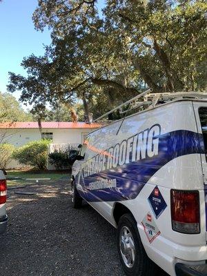 Our team installing a metal roof