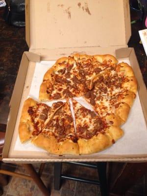 Wings were good. Soda was flat no carb whatsoever. And here's how the pizza looked when we received it.