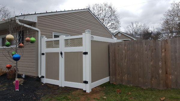 Two tone Khaki and White PVC privacy fence.