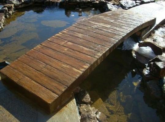 Bridge over fish pond.