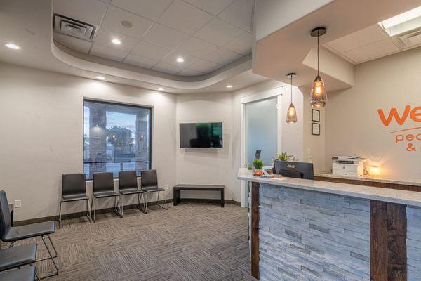 Wee Care Dentistry & Orthodontic front desk and waiting area.