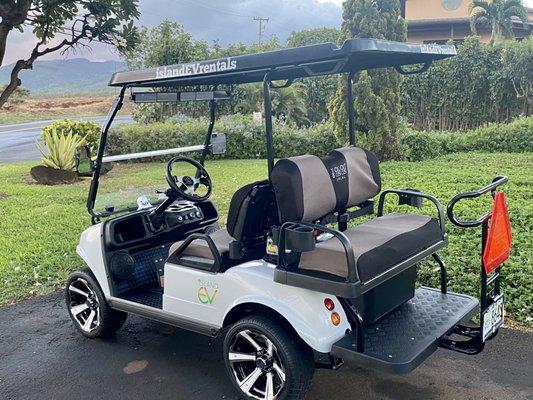 Our vehicles are a great way to get from the hillside to the resort or beach. The rear seat folds down making it great for hauling supplies!