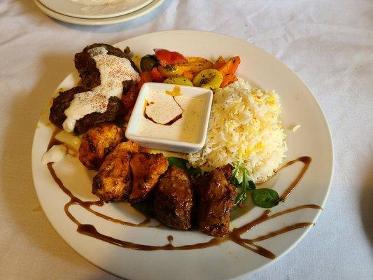 Caravan Kebab Special with lamb, chicken and Turkish Kofta Kebabs. The rice is awesome and the side veggies were absolutely amazing!