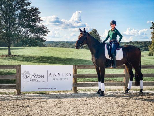 Claire in front of her sign at Chattahoochee Hills Eventing.