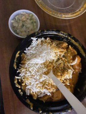 My rice with a tiny bit of bland chicken and a tiny salad. $12 :(