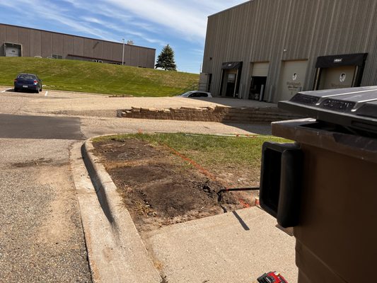 Removing dirt for sidewalk