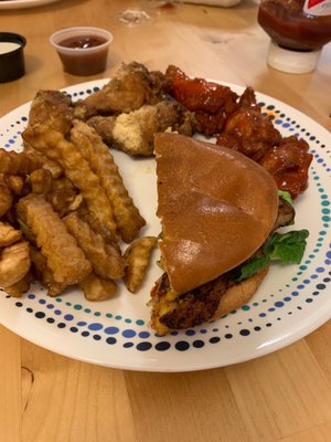 1/2 of the Blackened Fish Sandwich, fries, garlic Parmesan and Buffalo 7 Starr Wings